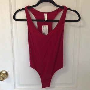 Pink American Apparel Bodysuit
